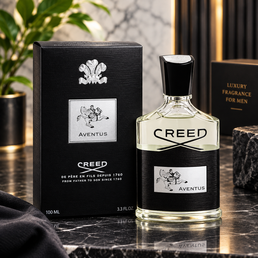 Creed Aventus Eau De Parfum 100ml luxury men's perfume bottle with black presentation box on an elegant dark marble background.